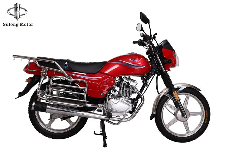 GN Style motorcycle with red fuel tank and spoked wheels