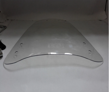 Windshield deflector installed on a vehicle