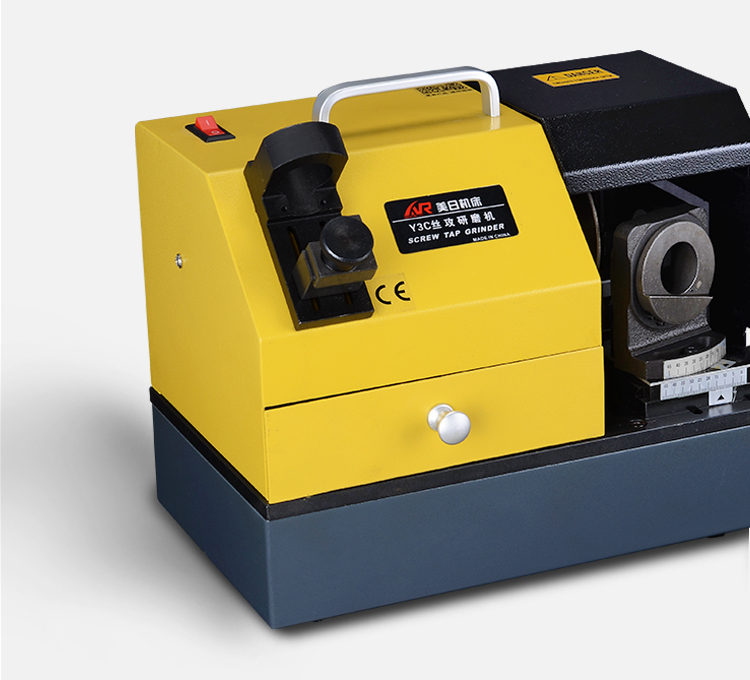 Portable screw tap grinding machine showing the compact design.
