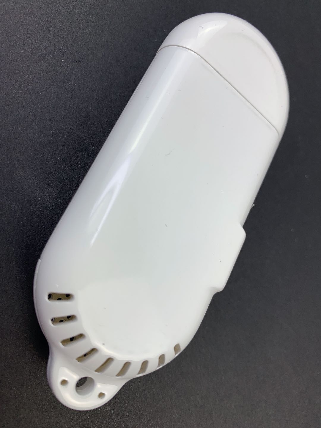 Compact white aromatherapy diffuser with hanging loop