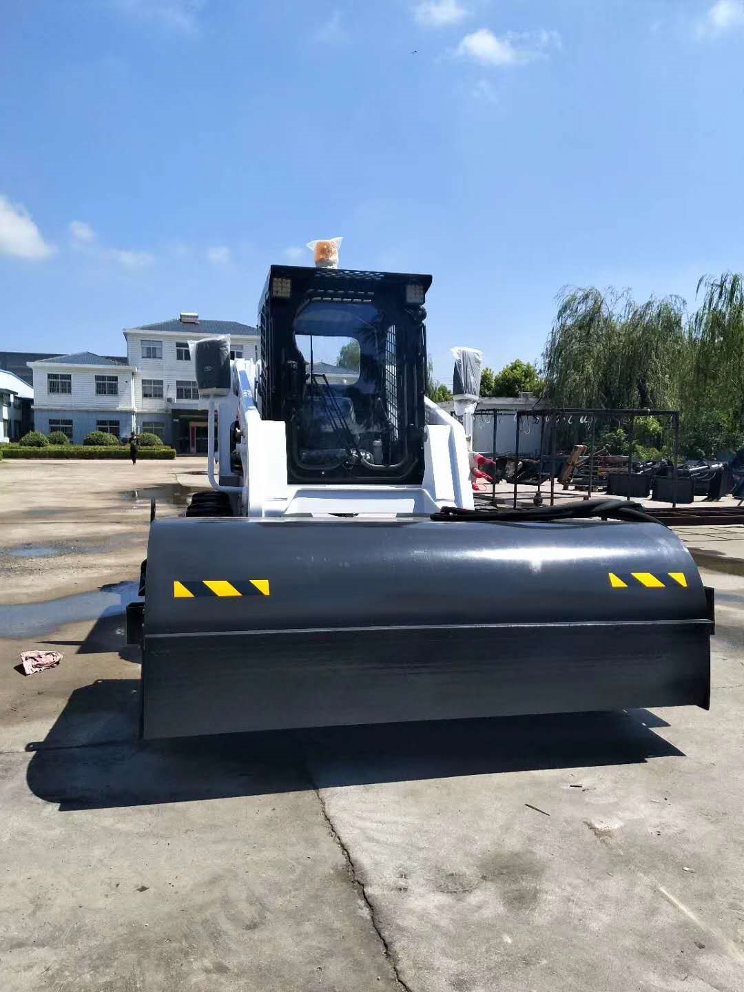 Close up of the operator cabin and loader arms