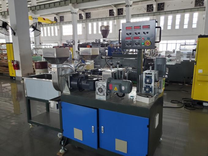 Compact industrial adhesive production machine with control panel