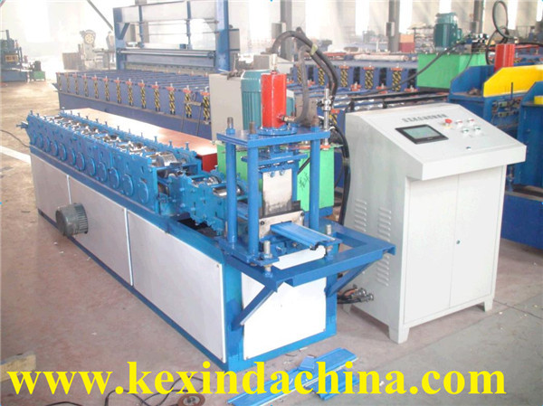 Full view of the automatic roll forming machine showing robust construction.