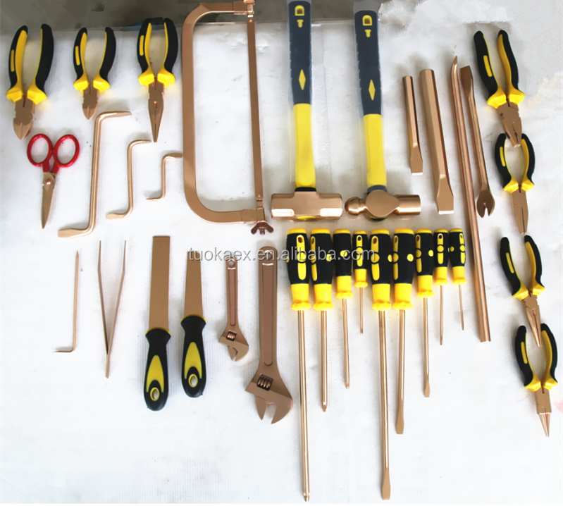 Assortment of non-sparking pliers, hammers, and wrenches