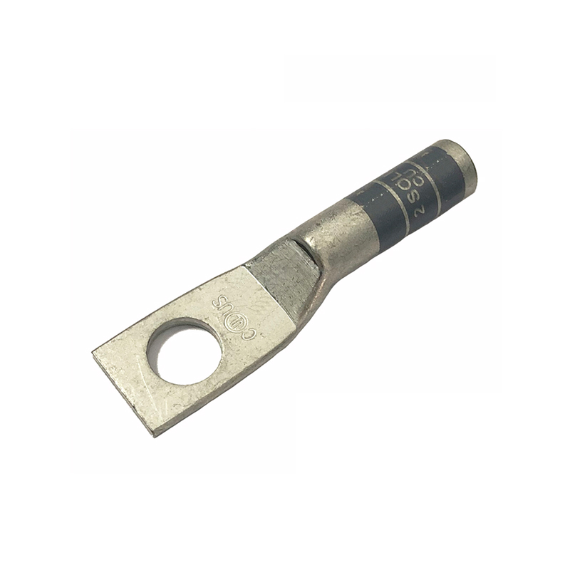 Close up of a one-hole copper lug showing the inspection window and markings