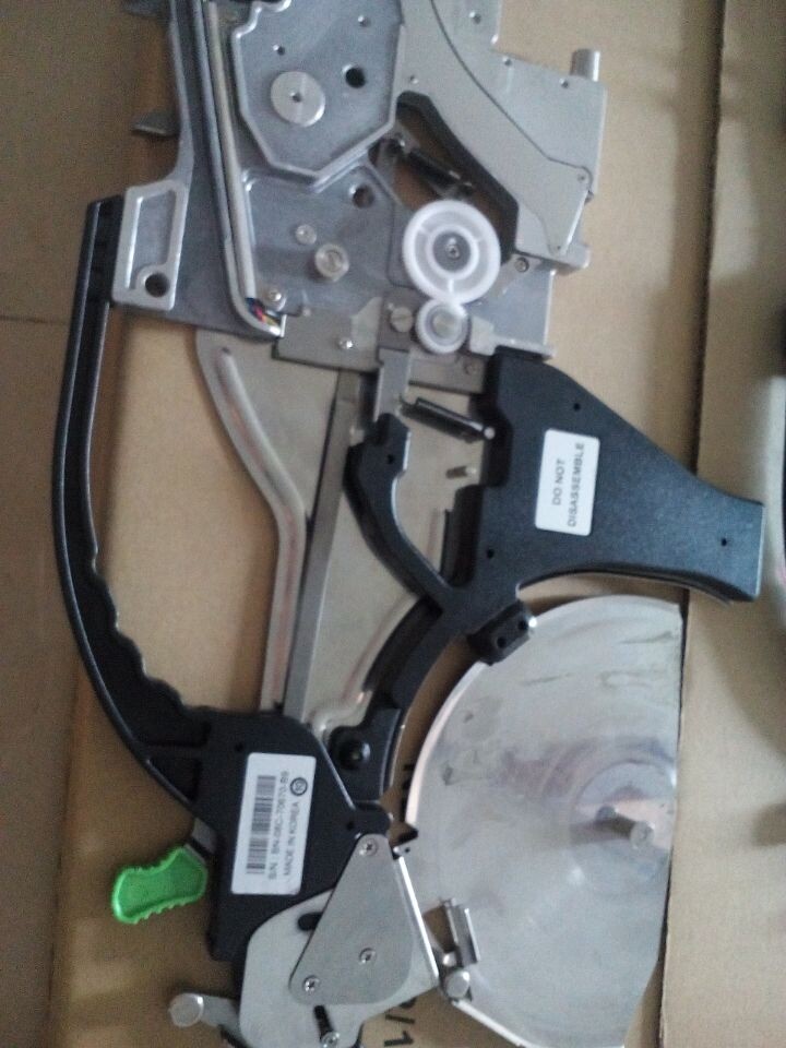 Close up view of the 8x2mm SMT component feeder mechanism