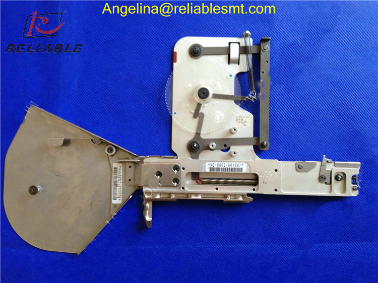 Side profile of the feeder showing identification labels and serial numbers