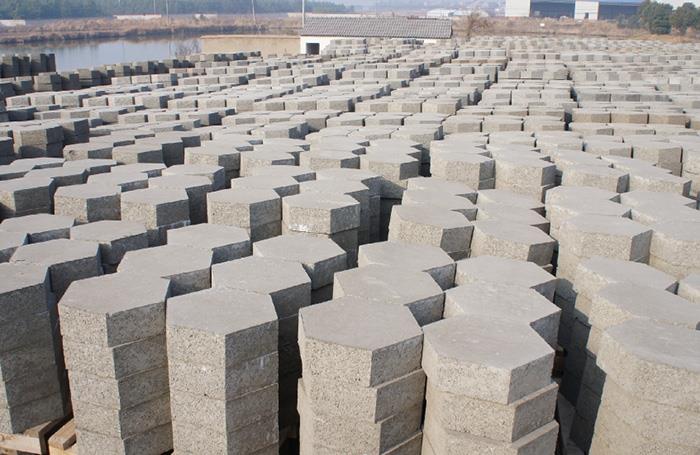 Finished concrete blocks stacked without pallets
