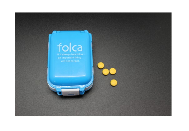 Portable pill case with secure latch