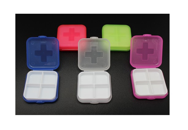 Square pill case with medical cross symbol