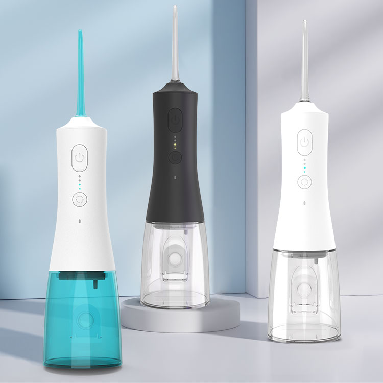Cordless portable water flosser in use