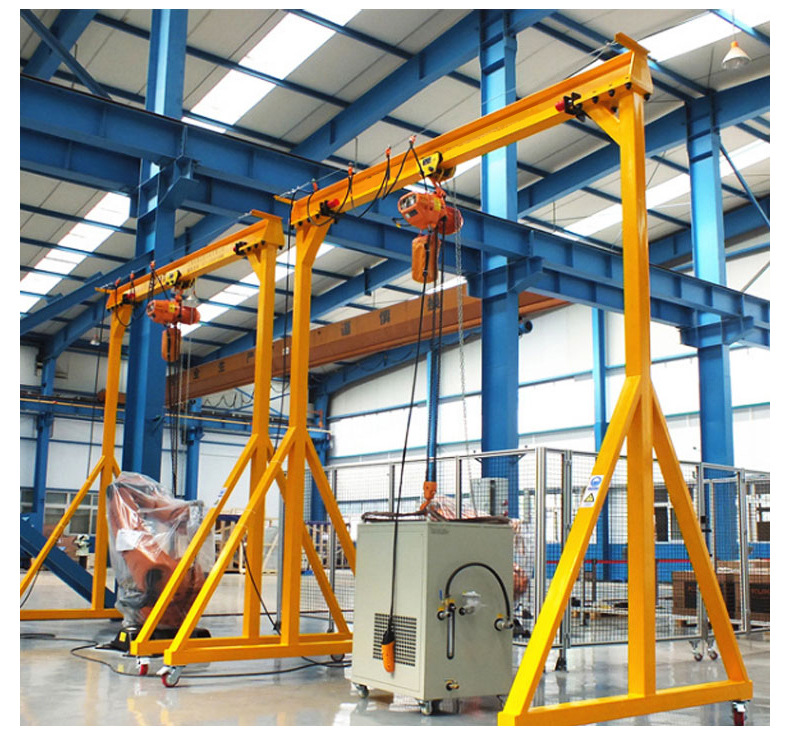 Portable mobile mini gantry crane in an industrial setting