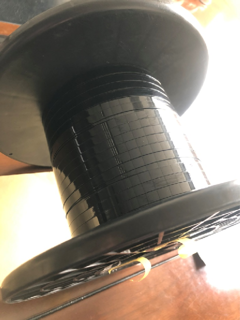 Photovoltaic Ribbon for Solar Panel Interconnection