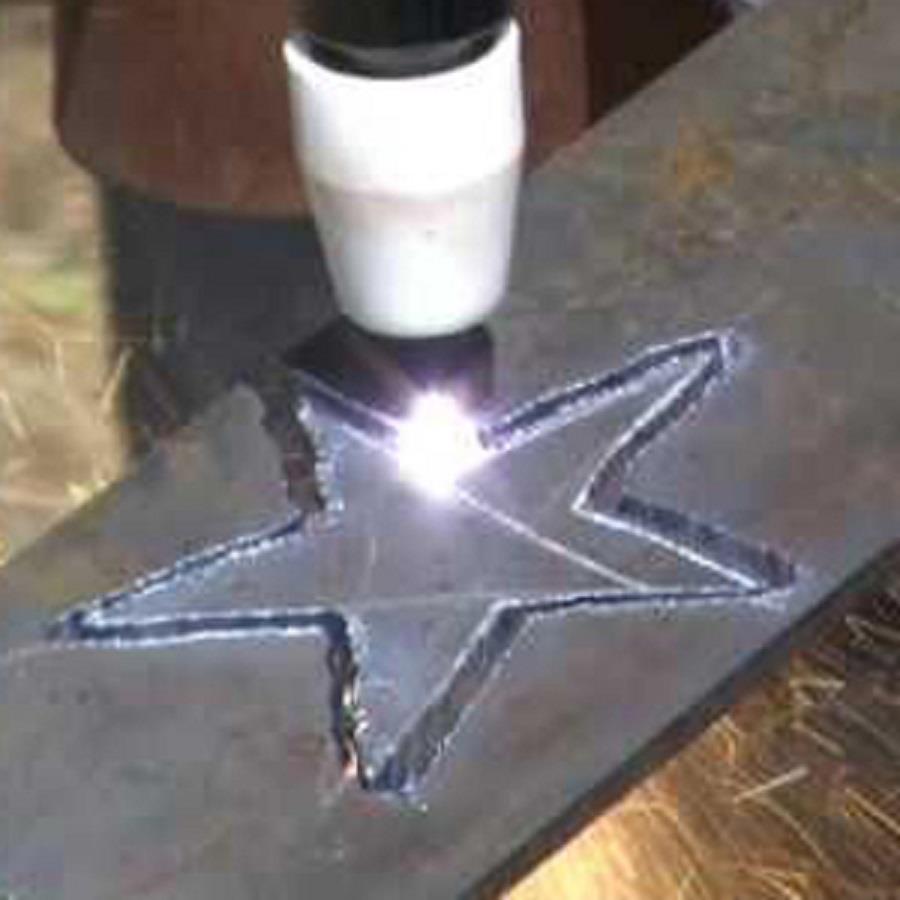 Professional welder performing maintenance task with compact inverter unit
