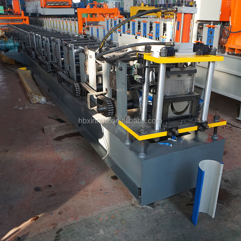 Side profile of industrial roll forming machine with steel frame