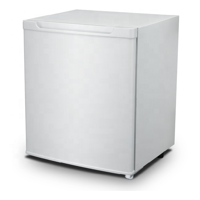 Compact hotel refrigerator in a room setting