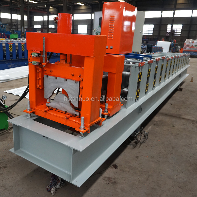 Side profile showing the rollers and orange cutting blade mechanism