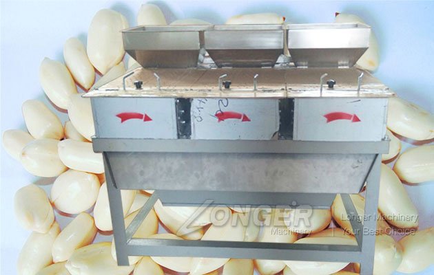 Side view of the dry type peanut skin removing machine showcasing hopper system