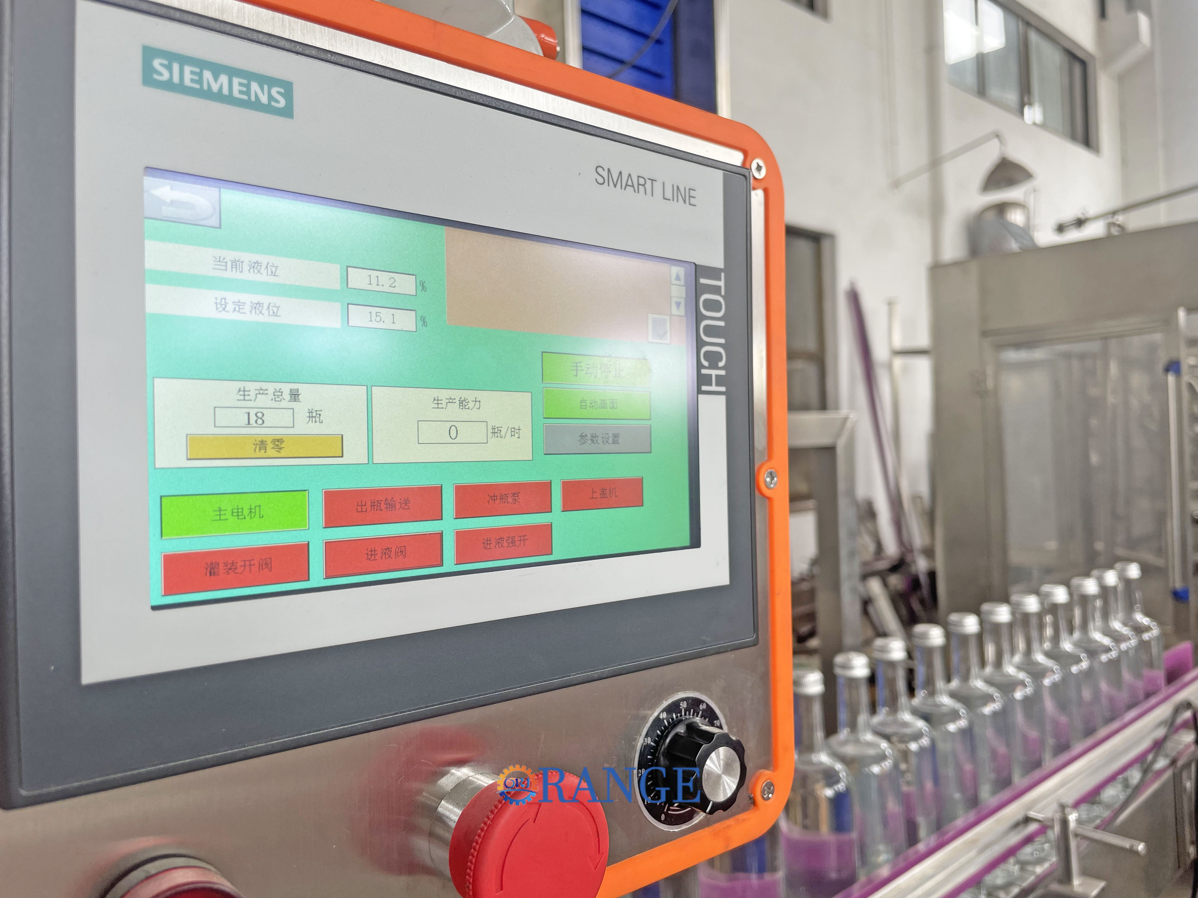 Close-up of the Siemens touch control panel on the filling machine