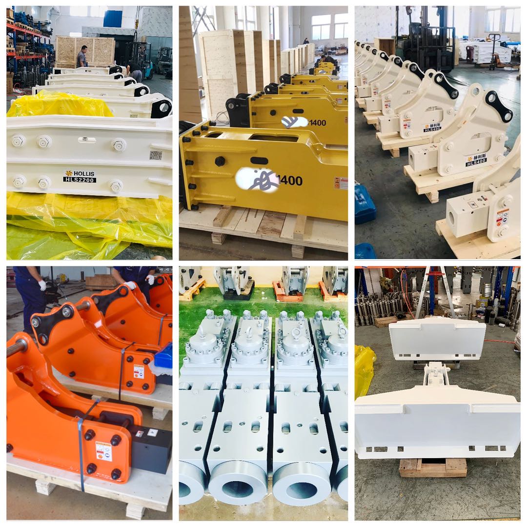 Heavy-duty side-type hydraulic breakers lined up for inspection.
