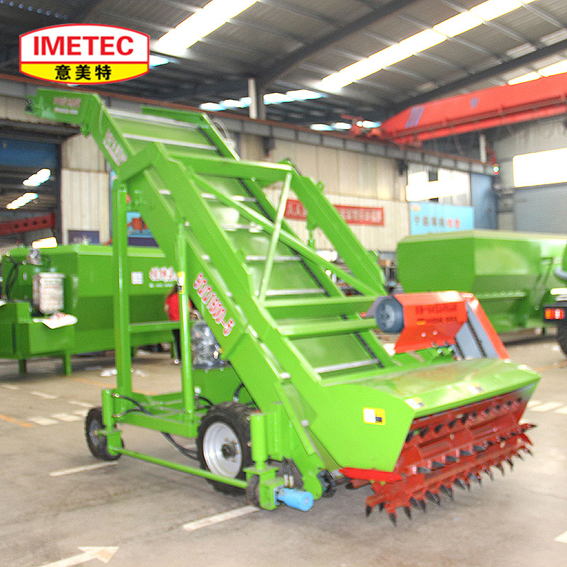 Close up view of the grabbing and conveyor system