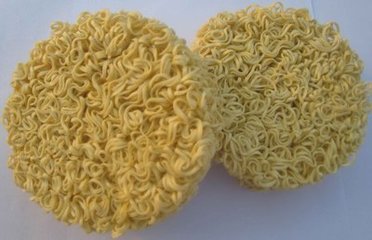 Formed circular fried instant noodles