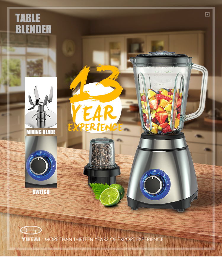 Electric food blender showing stainless steel housing and glass jar