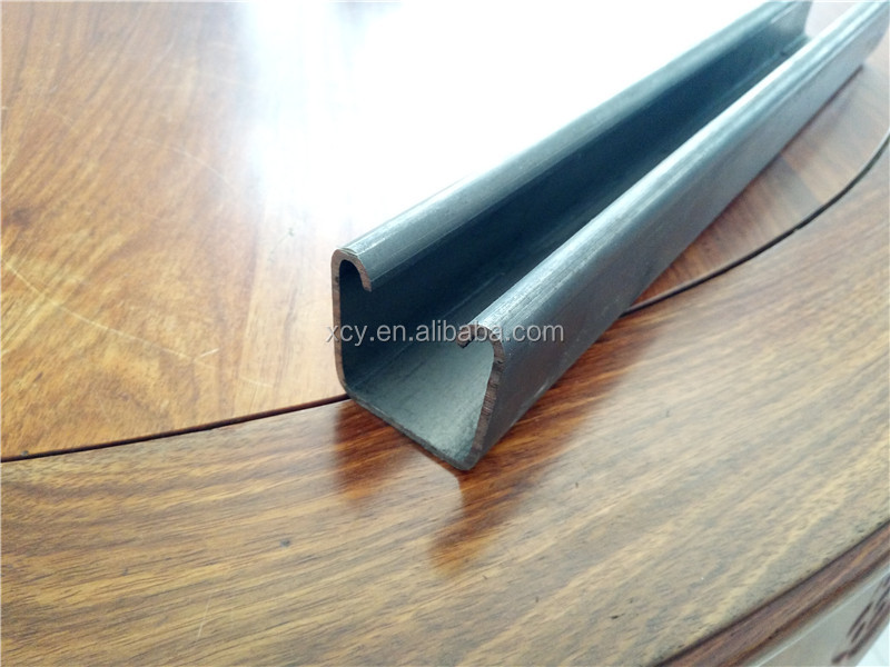 Side view of industrial roll forming equipment