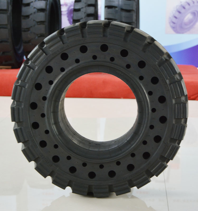 Close-up view of solid forklift tire tread pattern