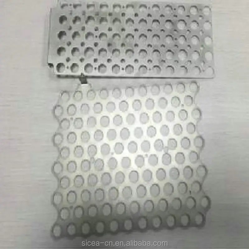 Metal components with matrix of circular perforations