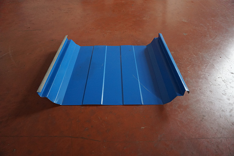 Finished standing seam metal roof panel cross section
