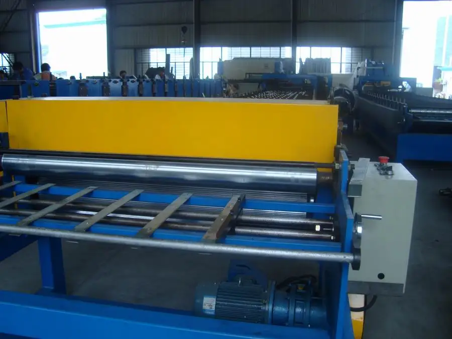 Side profile of the steel sheet embossing machine showcasing roller system