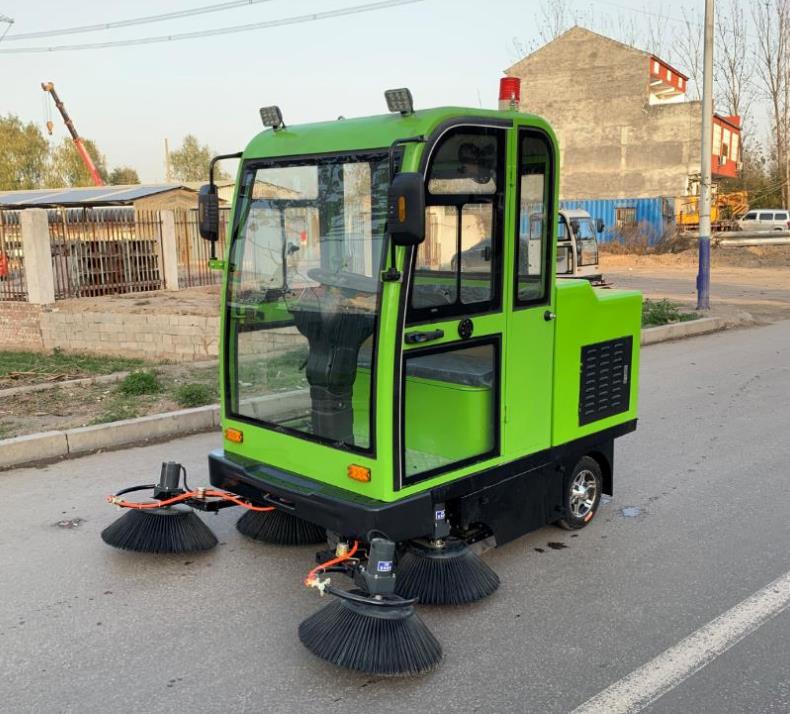 Electric street sweeper front view