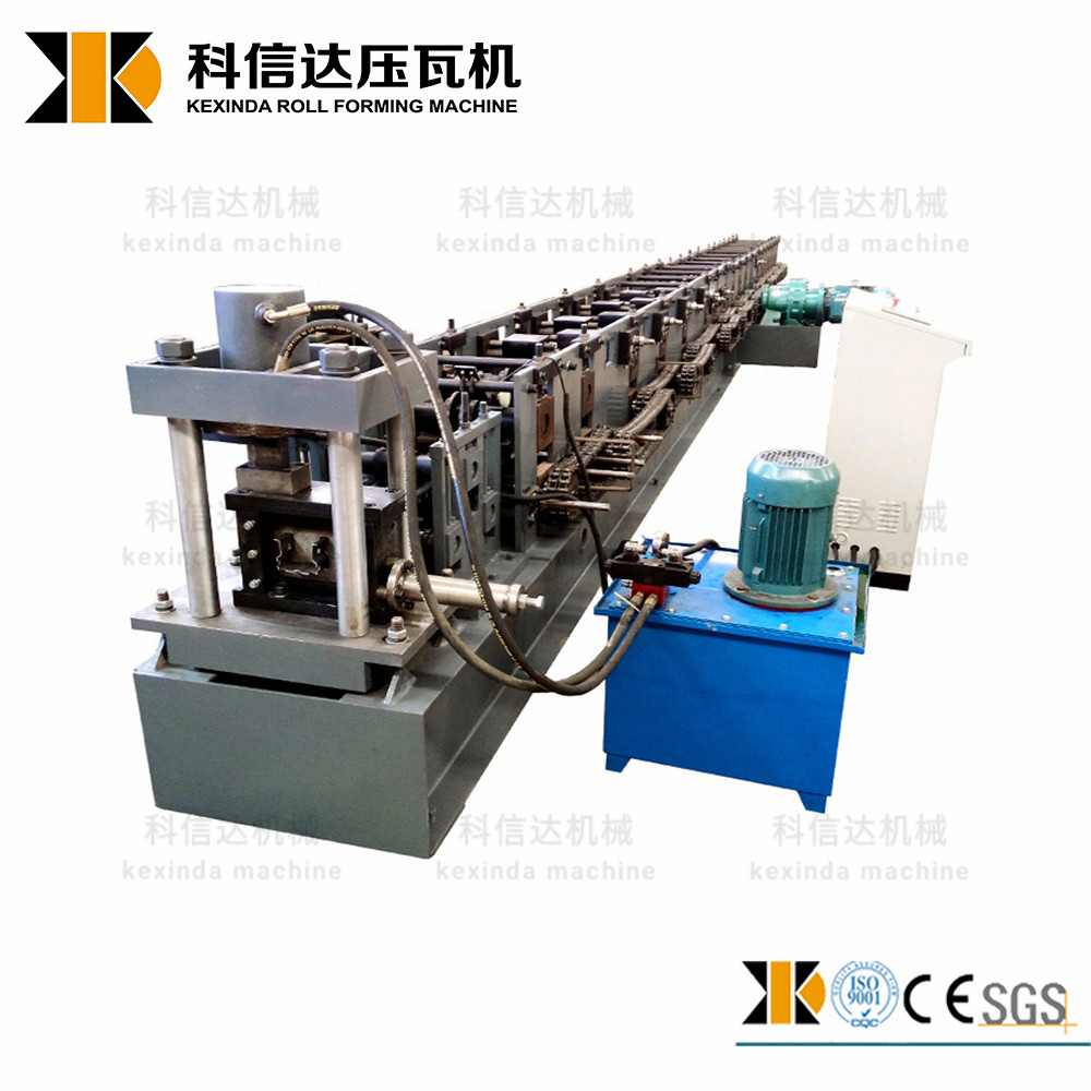 Close up of roll forming machinery hydraulic system and metal feeding