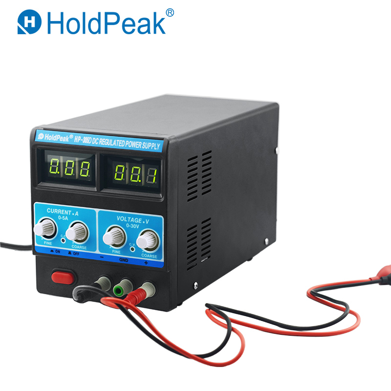 Front view of the adjustable DC regulated power supply showing LED displays and control knobs