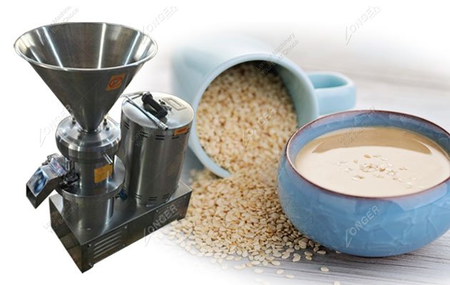 Stainless steel tahini grinding machine showing hopper and main unit