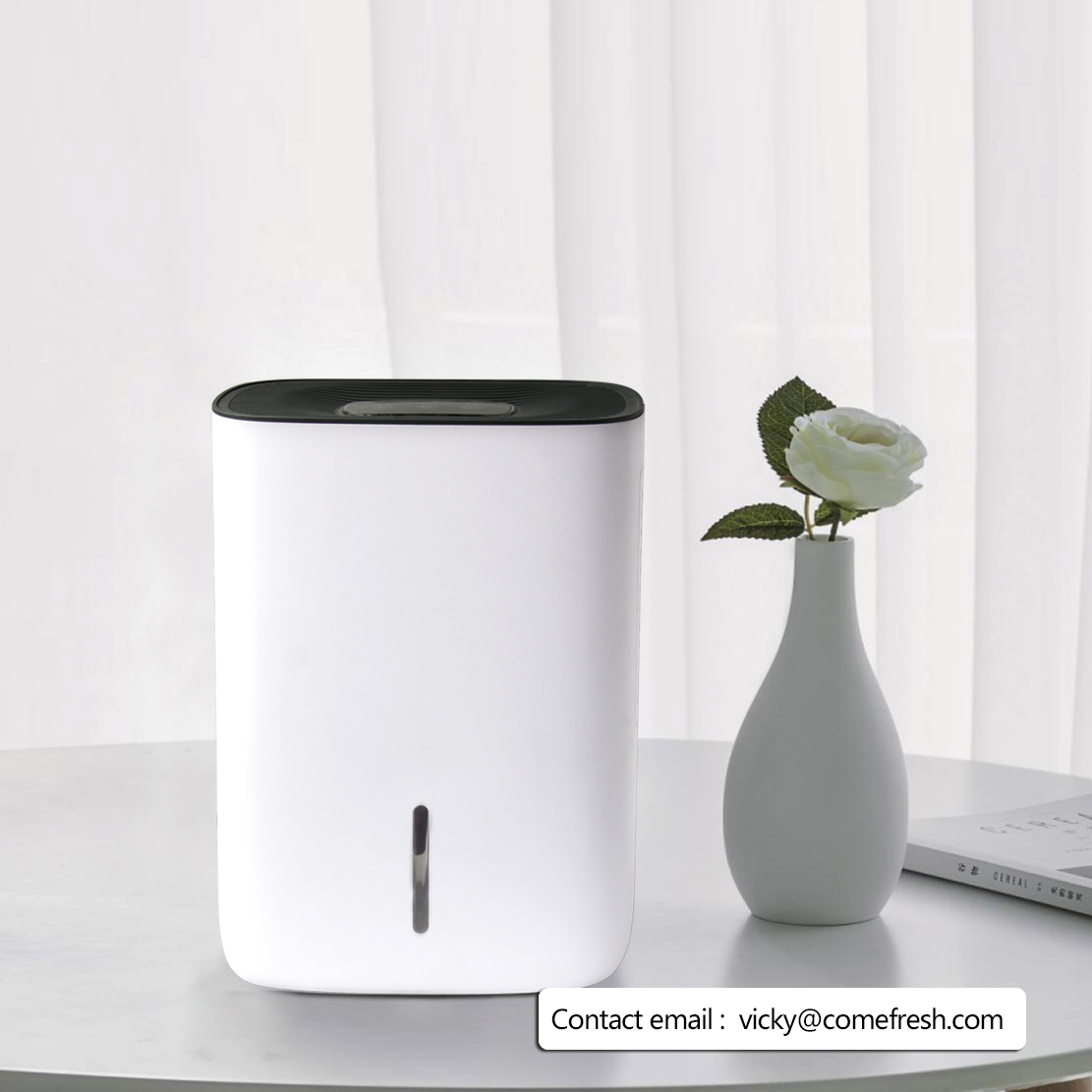 Sleek compact dehumidifier in a room setting