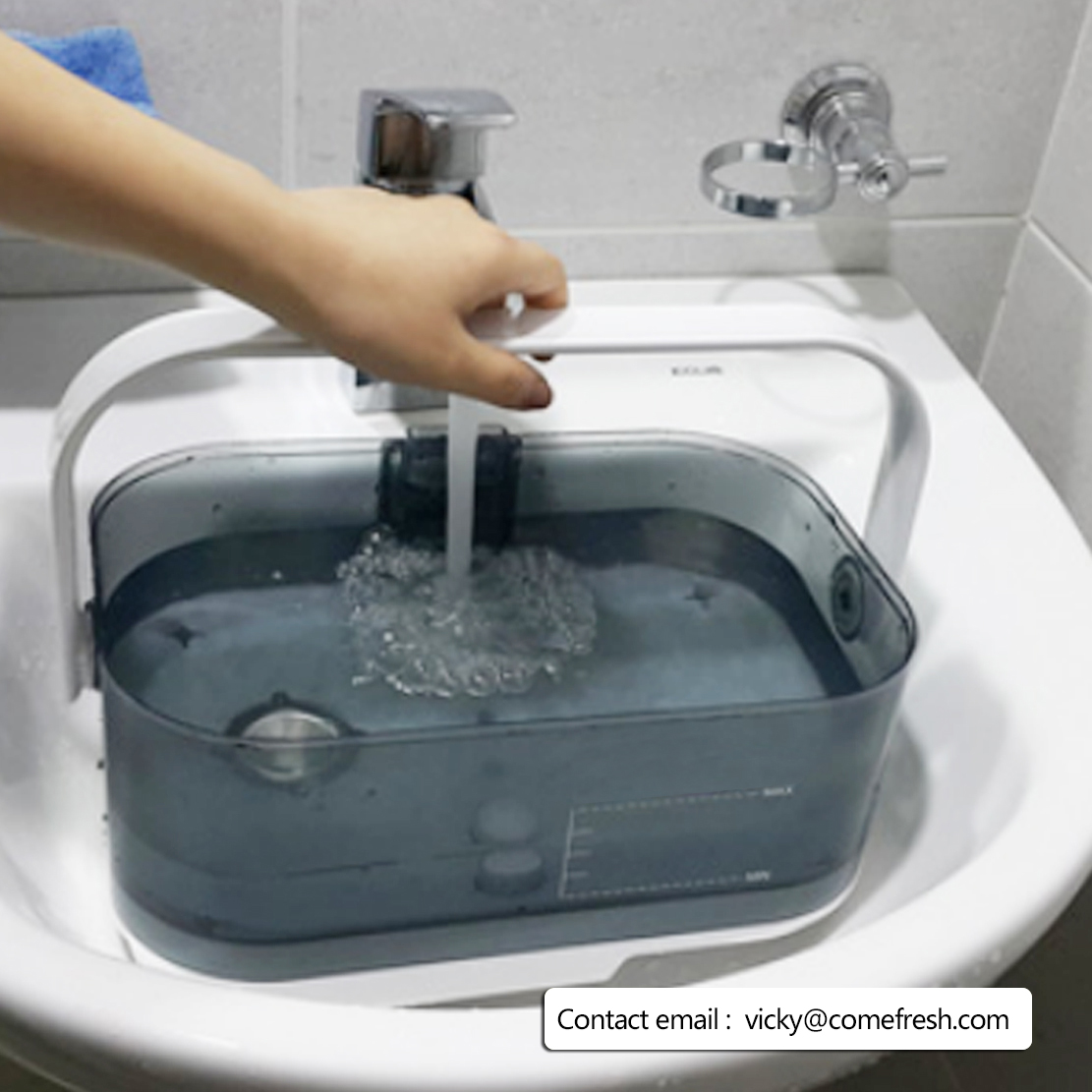 Top fill humidifier being refilled in a sink