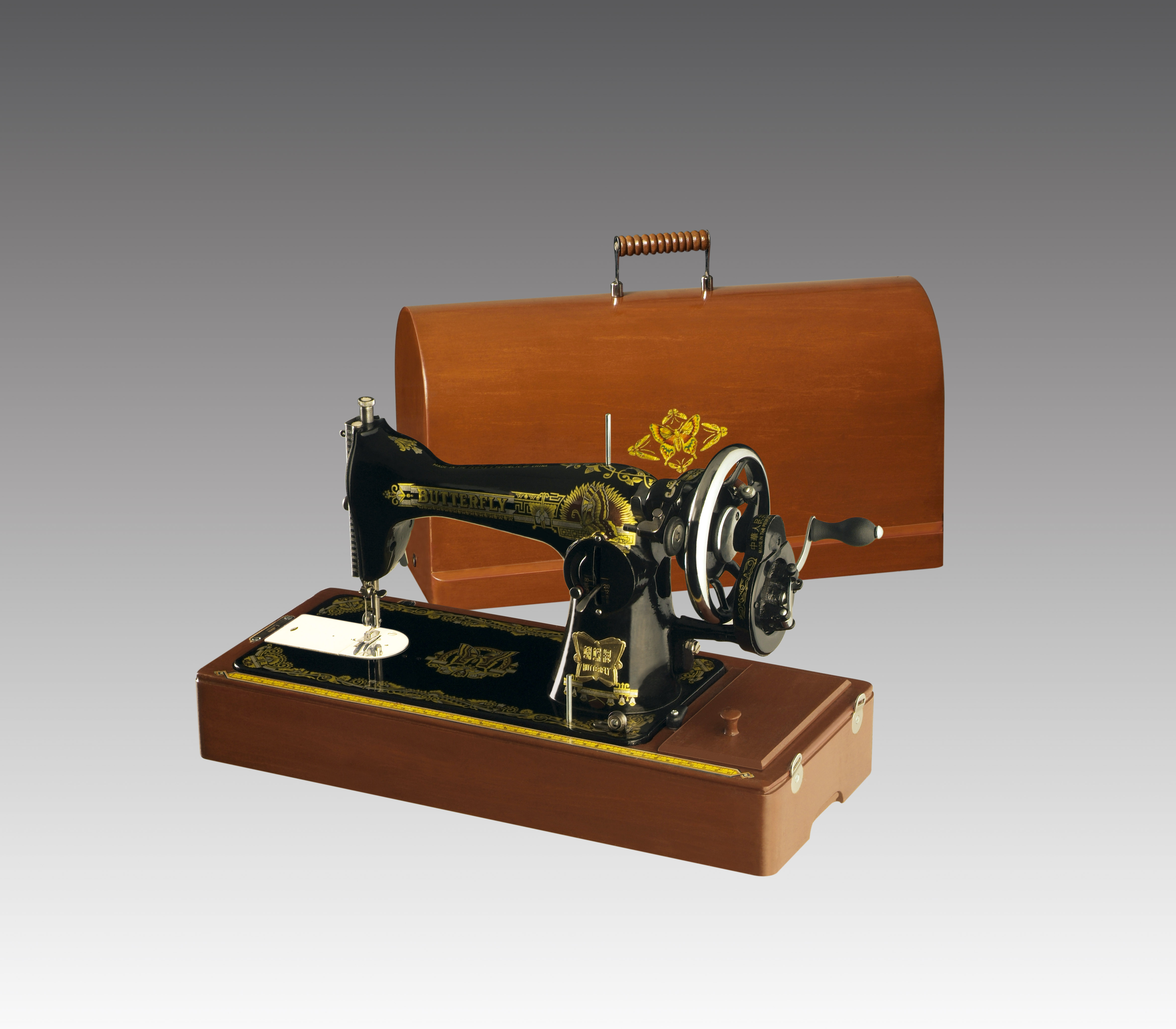 Vintage Hand-Crank Sewing Machine with Wooden Case