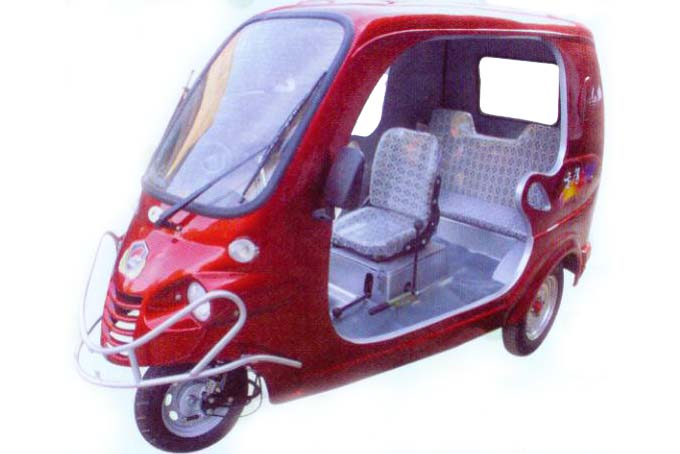 Compact Electric Three-Wheeled Vehicle with Enclosed Cabin