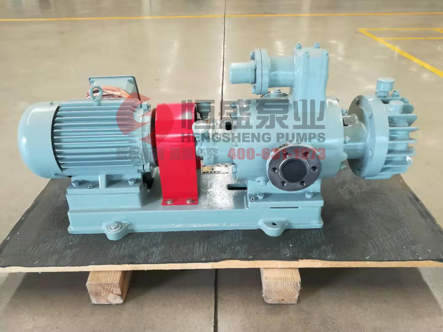 Industrial twin screw pump unit on a base plate with motor