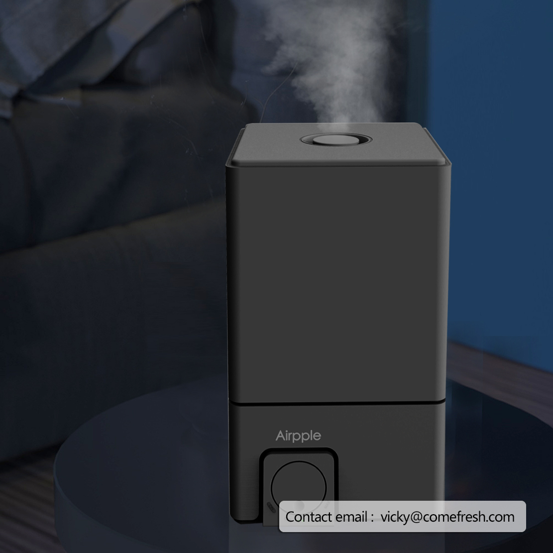 The humidifier operating in a dim night-time setting.