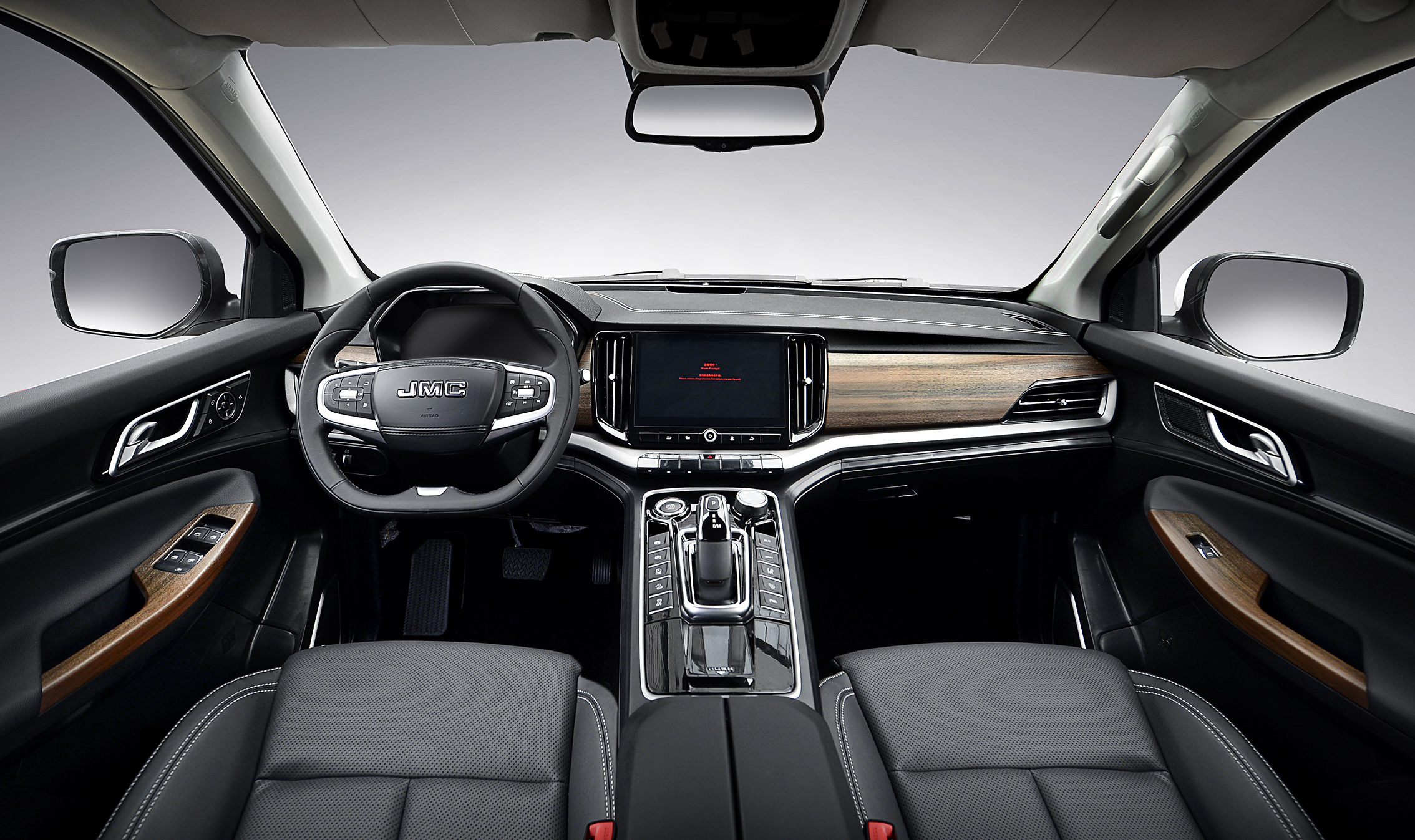 Modern dashboard with large infotainment screen and premium interior trim