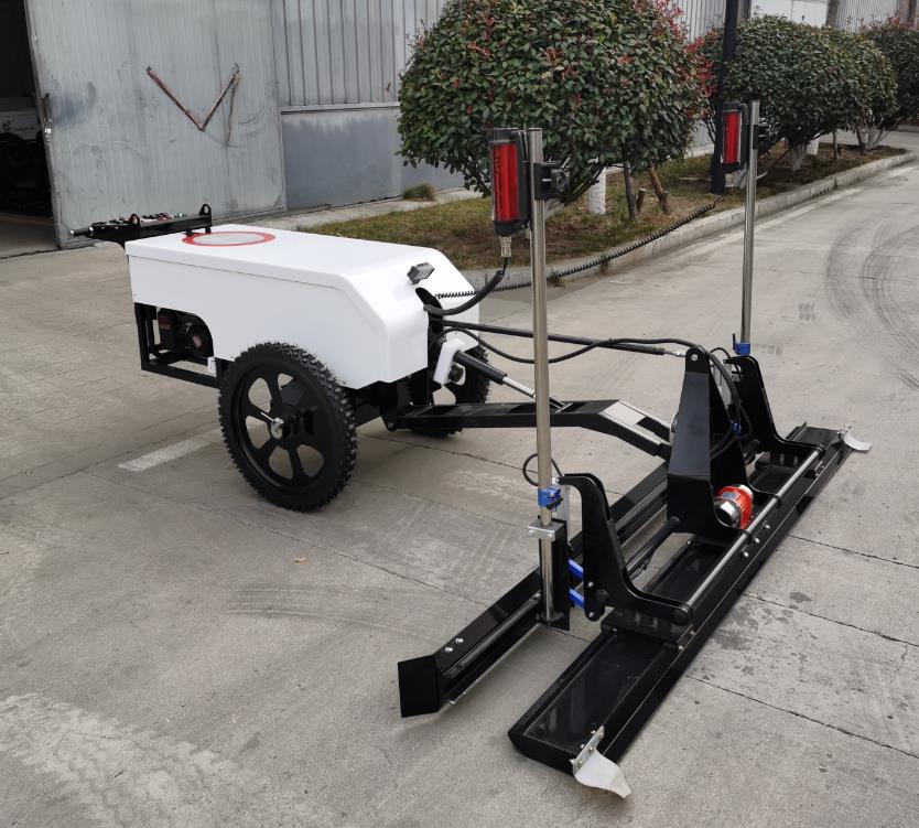 Walk-behind laser screed machine in operation