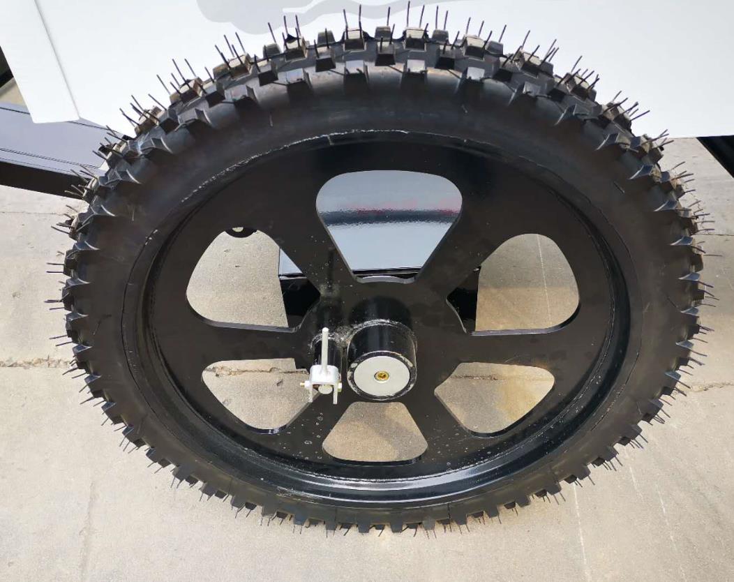 Side view of the machine showing the tire assembly