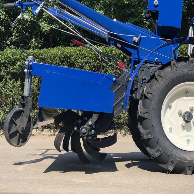 walking behind tractor - Image 3