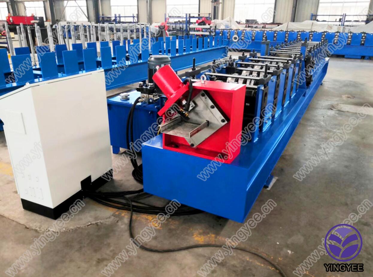 Front view of the embossing machine with control panel and hydraulic cutting unit