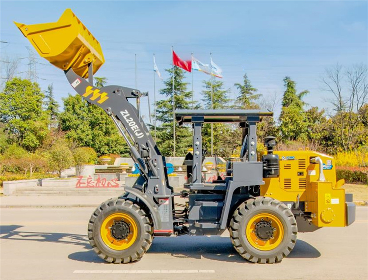 Close up of loader bucket and hydraulic system