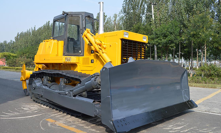 Front view of the bulldozer showing the blade and tracks