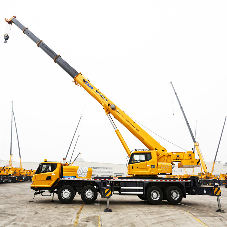 Rear angle view of the truck crane showing boom assembly